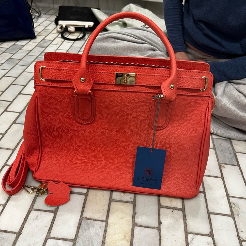 Never used coral markese purse